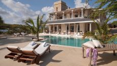 villa exterior with pool