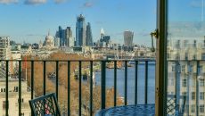 Balcony Junior Suite River View balcony and view at The Savoy