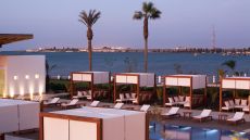 poolside cabanas water view