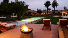 outdoor pool night fire