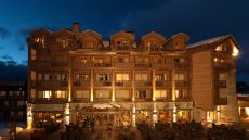 Le Portetta exterior at night