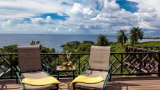 pool loungers with ocean view