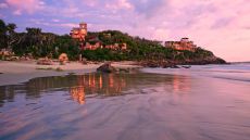 See more information about Imanta Resort beach view sunset