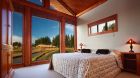 guestroom bed with huge window