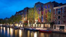AMSAZ Exterior Evening Close Andaz Amsterdam