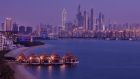 Exterior View Over Water Villas and Skyline Anantara The Palm Dubai Resort