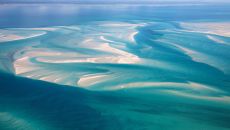 beach sand dunes with clouds anantara bazaruto island resort and spa