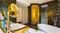 golden bathroom at W Bogota