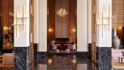 lobby living room lights art sculpture chairs marble resort at Park Hyatt Marrakech