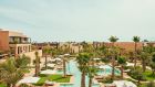 overview resort oasis pool pavillon sky palmtrees blue ochre green at Park Hyatt Marrakech