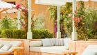 main pool atlas lounge chair sunshade palm vegetation flowers sun day at Park Hyatt Marrakech