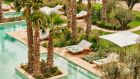 oasis pool overview blue palmtrees sunbeds sunshades vegetation greenery at Park Hyatt Marrakech