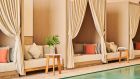 spa pool relaxation beds curtains pillows table flowers at Park Hyatt Marrakech