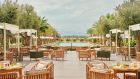 restaurant pavillon terrace pool pergolas tables vegetation pool atlas mountains views at Park Hyatt Marrakech