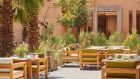 Tfaya brasserie arabesque outside terrace restaurant breakfast setup at Park Hyatt Marrakech