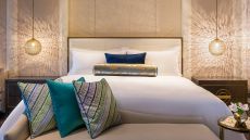 spacious bed and couch at St. Regis Langkawi