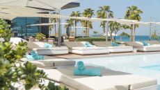 Hotel Pool with sunbeds at Nikki Beach Resort Spa Dubai