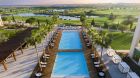 See more information about Anantara Vilamoura Algarve Resort Main pool aerial