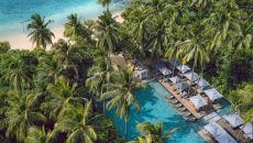 Palm fringed main pool at Vakkaru Maldives at Vakkaru Maldives