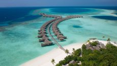 Aerial over water villa at Vakkaru Maldives