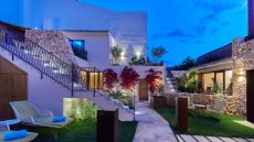 See more information about Sa Creu Nova Petit Palais Art & Spa Exterior evening  