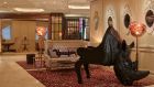 Lobby of Great Scotland Yard Hotel London with rhino piano