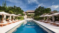 Swimming Pool and Loungers Aman Villas at Nusa Dua 2024