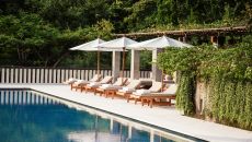 Swimming Pool and Loungers Aman Villas at Nusa Dua 2024