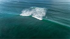 Surfing at Echo Beach COMO Uma Canggu