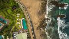 Aerial view of the COMO Beach Club pool and the beach COMO Uma Canggu