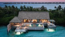 King Grand Reef Villa Twilight Aerial View at Waldorf Astoria Maldives Ithaafushi