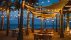 beach restaurant at night Conrad Punta de Mita
