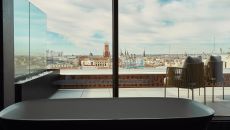 Guestroom bathroom Madrid city views Thompson Madrid