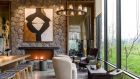 Singita Kwitonda Lodge Lounge Area with Fireplace Singita Kwitonda Lodge