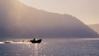 Passalacqua Lake and boat Giumello