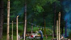 Archery field group dining with staff COMO Uma Paro