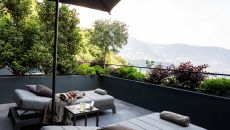 patio loungers with drinks at Hotel AVIDEA