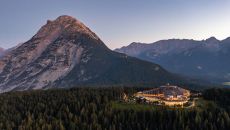 night exterior from afar at Interalpen Hotel Tyrol