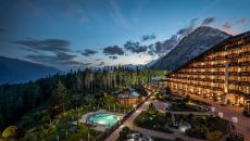 night exterior with outdoore pool at Interalpen Hotel Tyrol