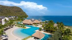 See more information about InterContinental Dominica Cabrits Resort & Spa Architecture Drone Pool Beach 7 at Inter Continental Dominica Cabrits