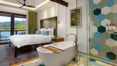 Suite Ocean View Suite Bed Bathroom at Inter Continental Dominica Cabrits