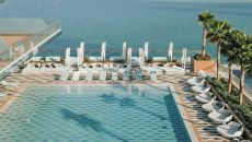 Fairmont gold pool drone at Fairmont Doha