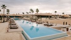 commonspace pool front02 at Our Habitas Ras Abrouq