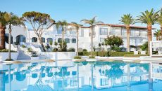 93 lazy days splashing around the pools shimering turquoise waters at Caramel A Grecotel Resort to Live