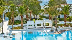 89 order a drink from the poolside brasserie and indulge in a truly relaxed experience at Caramel A Grecotel Resort to Live