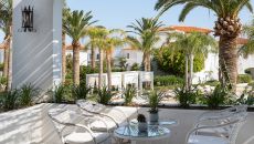 76 panther lobby bar outdoor spaces with a pool view at Caramel A Grecotel Resort to Live