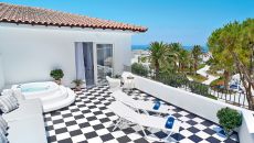 32 caramel luxury suite with private outdoor hydromassage bathtub at Caramel A Grecotel Resort to Live