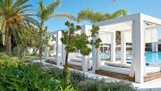 91 grab your chance to cool of with a drink under a tents shade next to the luxurious confetti pool at Caramel A Grecotel Resort to Live