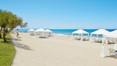 88 attentive service at the caramel colored sandy beach at Caramel A Grecotel Resort to Live
