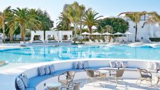 64 gorgeous poolside tables to eat drink and rest at Caramel A Grecotel Resort to Live
